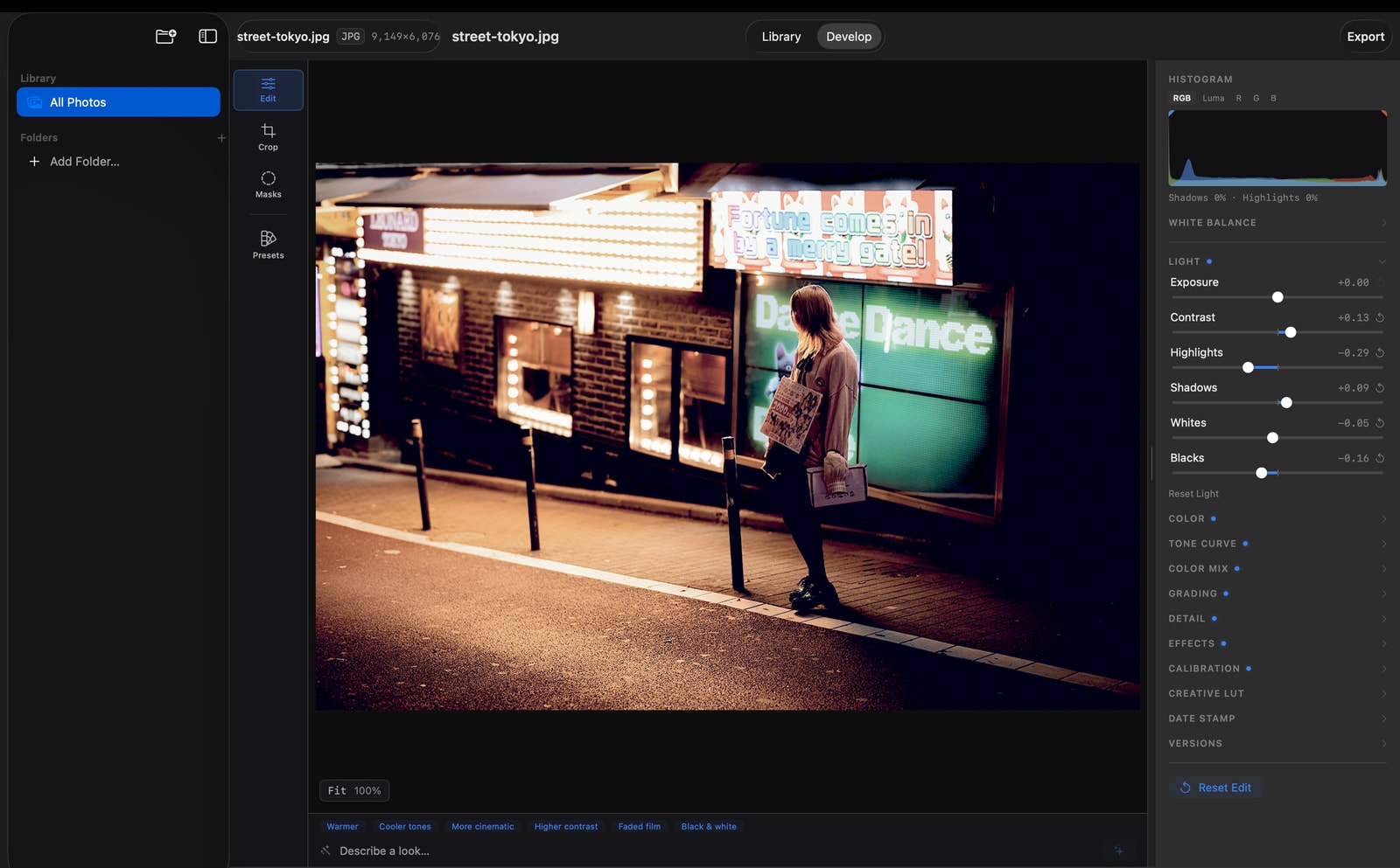 The Halumo desktop workspace editing a Tokyo night photograph with filmstrip, histogram, tone curve, and colour controls